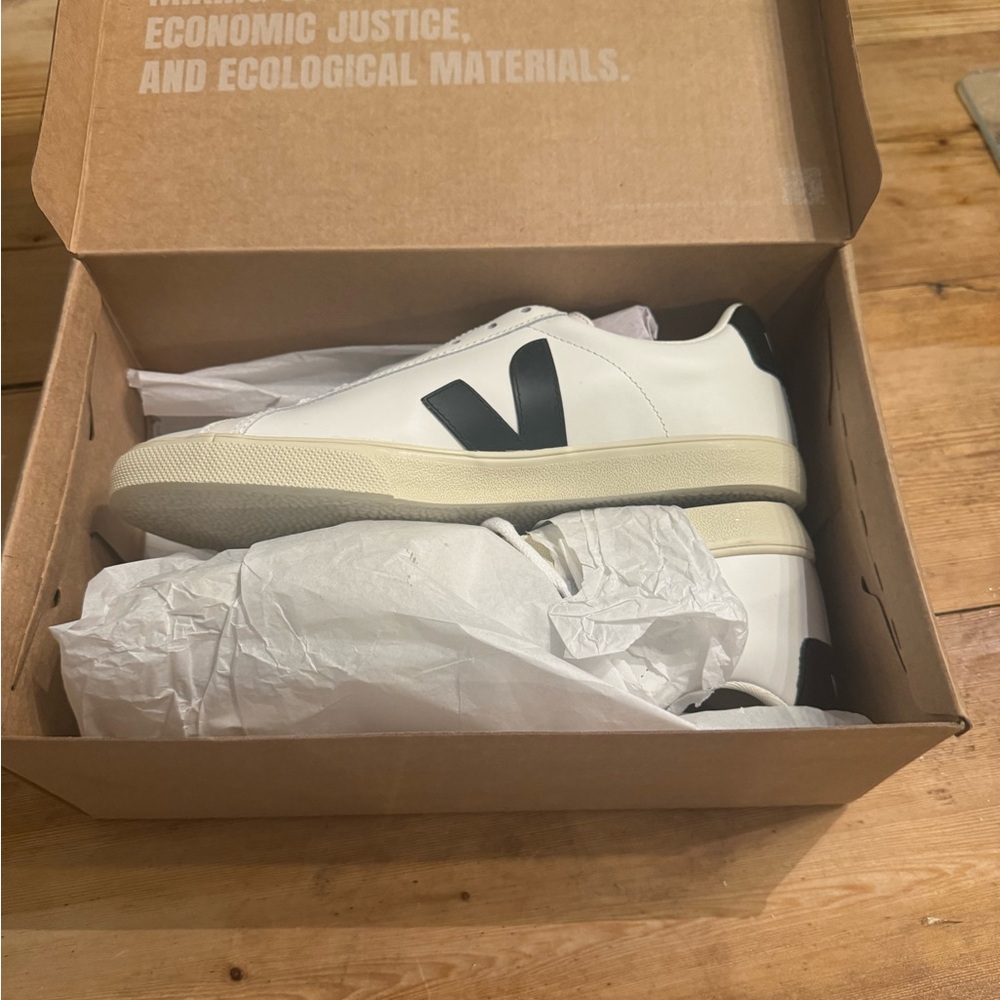 Brand New! Never Worn!  Black/white Veja woman’s sneakers.